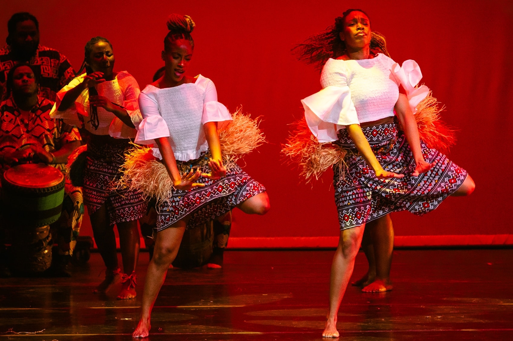 African dance ensemble performing traditional choreography